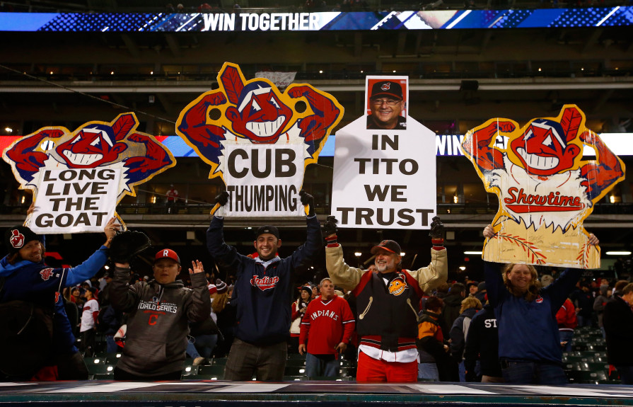 CLEVELAND, OH - OCTOBER 25: Cleveland Indians fans hold signs after the Cleveland Indians defeated the Chicago Cubs 6-0 in Game One of the 2016 World Series at Progressive Field on October 25, 2016 in Cleveland, Ohio. (Photo by Jamie Squire/Getty Images)