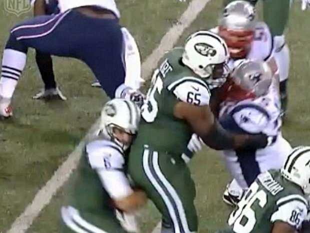 mark-sanchez-fumbles-off-of-his-teammates-butt-in-a-play-that-pretty-much-sums-up-jets-patriots
