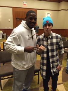 Pittsburgh Steelers linebacker Arthur Moats posing with Justin Bieber.
