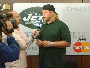 Nick Mangold standing in front of a replica of my ATM Card