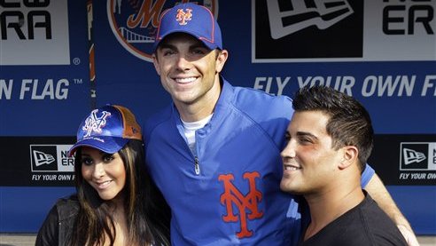 New York Mets third baseman David Wright, center, poses with reality television star Nicole "Snooki" Polizzi, and her fiance Jionni LaValle before the Mets baseball game at Citi Field in New York, Monday, July 23, 2012. (AP Photo/Kathy Willens)