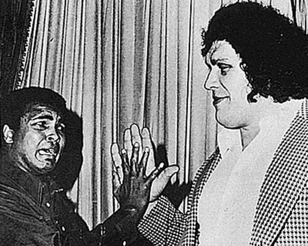 Muhammad-Ali-comparing-hands-with-Andre-the-Giant-1976