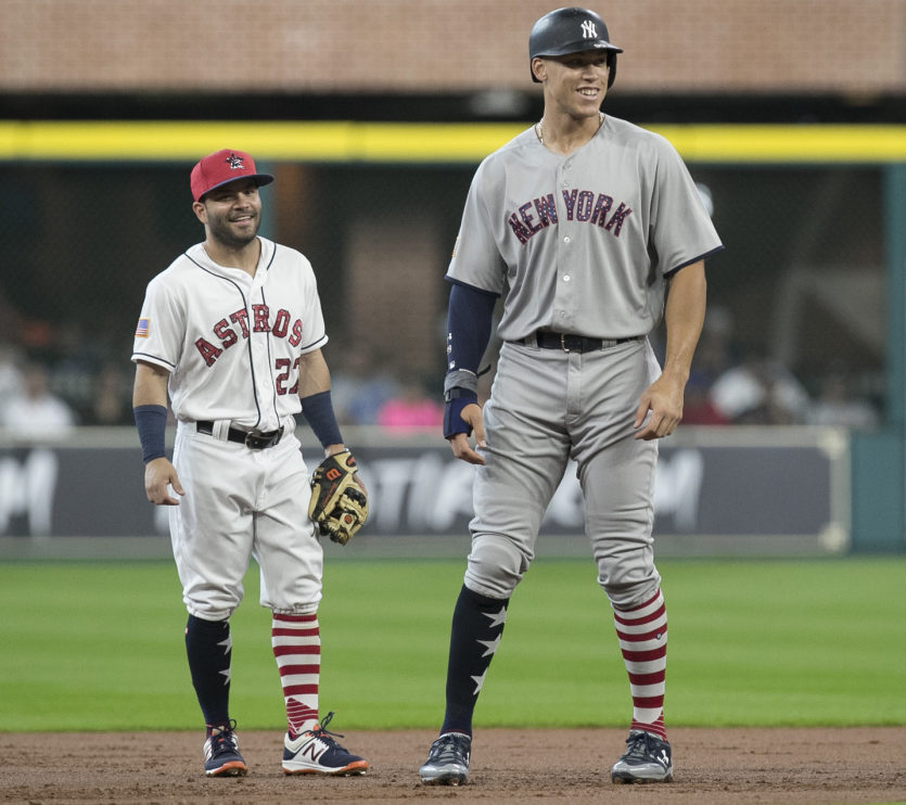New York Yankees' Aaron Judge, right, and Houston Astros second baseman Jose Altuve have a conversation during the first inning of a baseball game, Sunday, July 2, 2017, in Houston. Both players have been elected to start in the All-Star Game in Miami on July 12, 2017. (Yi-Chin Lee/Houston Chronicle via AP) ORG XMIT: TXHOU201